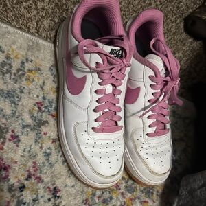 Nike White and Pink Sneakers Classic Low-Top Design